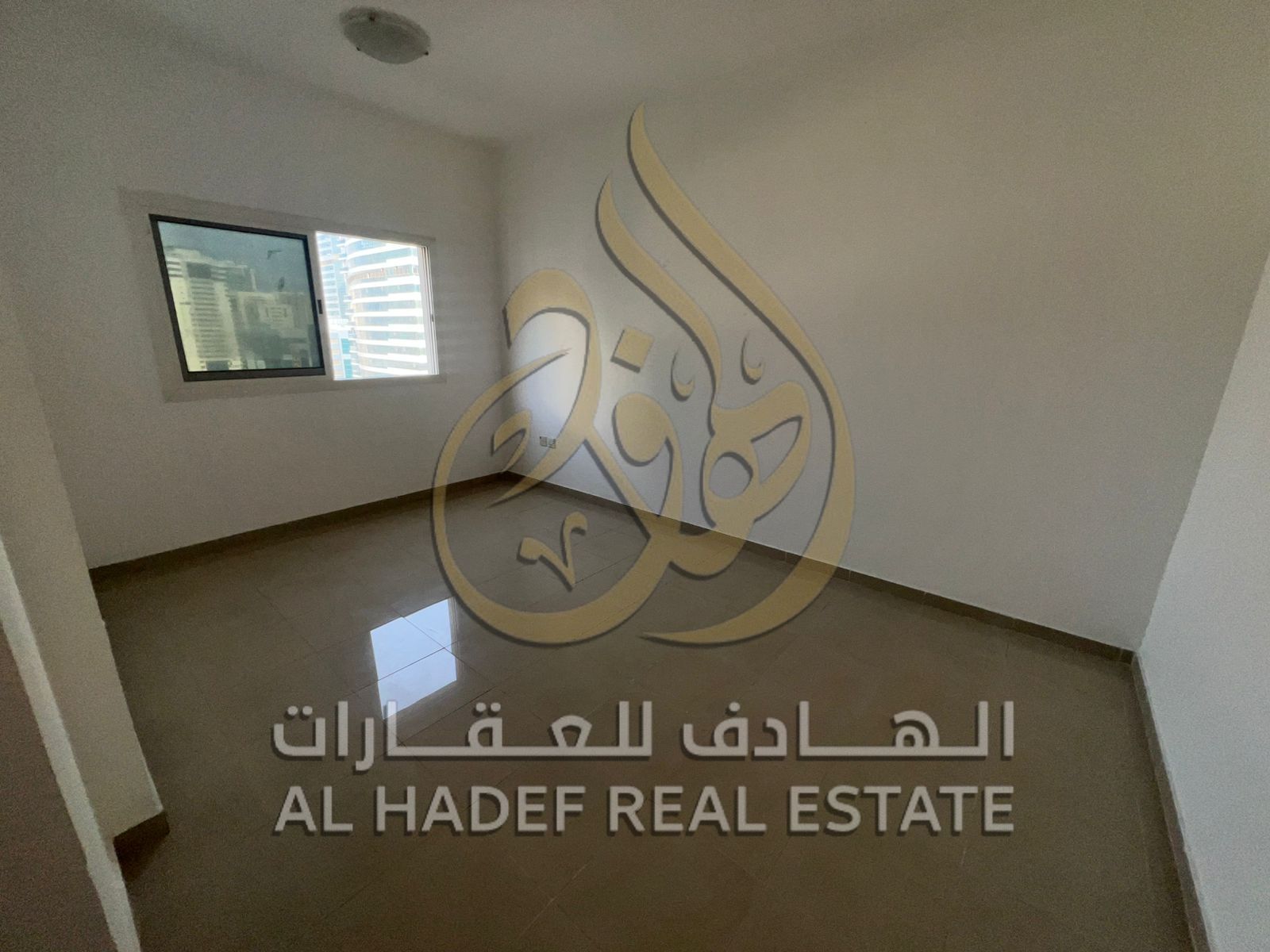 Affordable 1-bedroom apartment for rent in Al Taawun, spacious layout, prime location close to all services with easy exit to Dubai, 4 or 6 cheques.