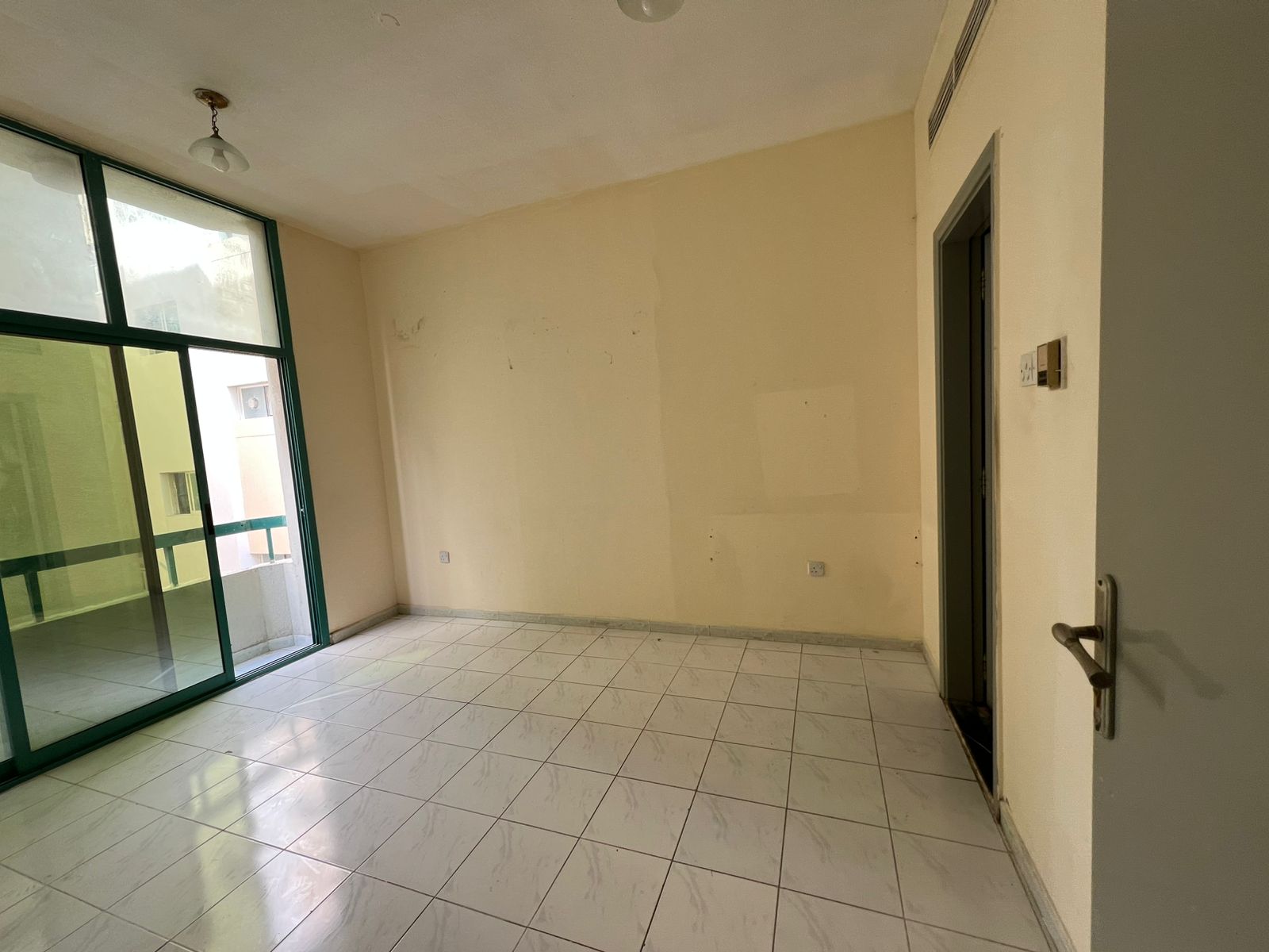 Cheapest 1BR in Sharjah with balcony and central AC, close to Nesto and all markets and malls, prime location, ready to move in