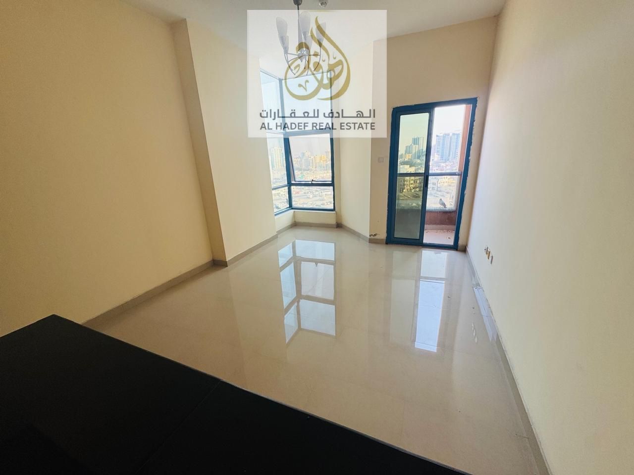 For Annual Rent in Al Nuaimiya Towers – Al Nuaimiya Towers Studio with an open-plan American kitchen, practical design, and ample space for a sin