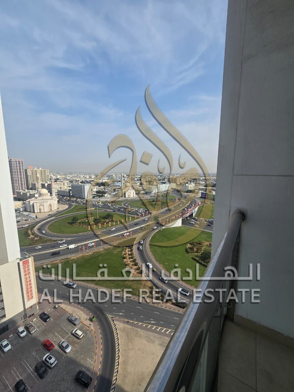 For rent: 2BR + living room, 3 baths (2 master), balcony, laundry room, free parking, open view in Al Taawun area.