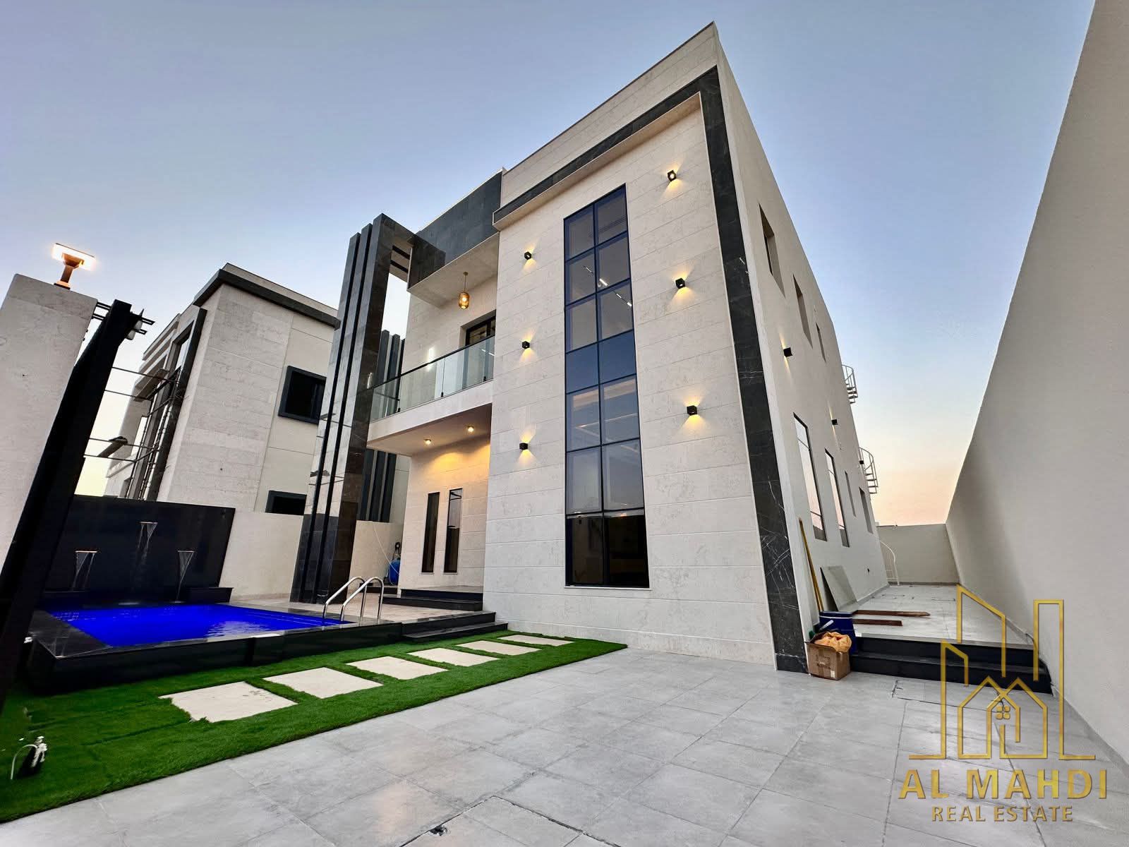 For sale in Al Zahia: a villa with 4 master bedrooms, a majlis (formal sitting room), a living room, a spacious kitchen, a maid's room, and a swimming