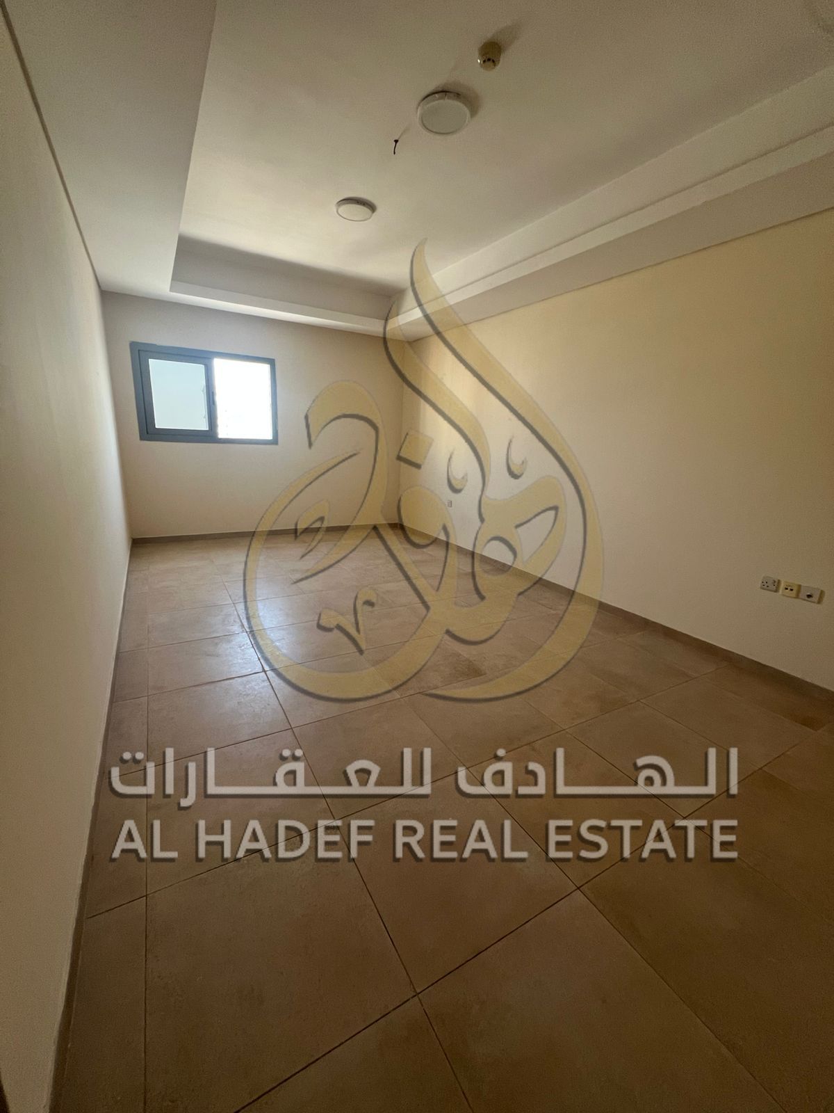 2BR + living room apartment in Al Qasimia, near Mega Mall, free parking, with one month free rent.