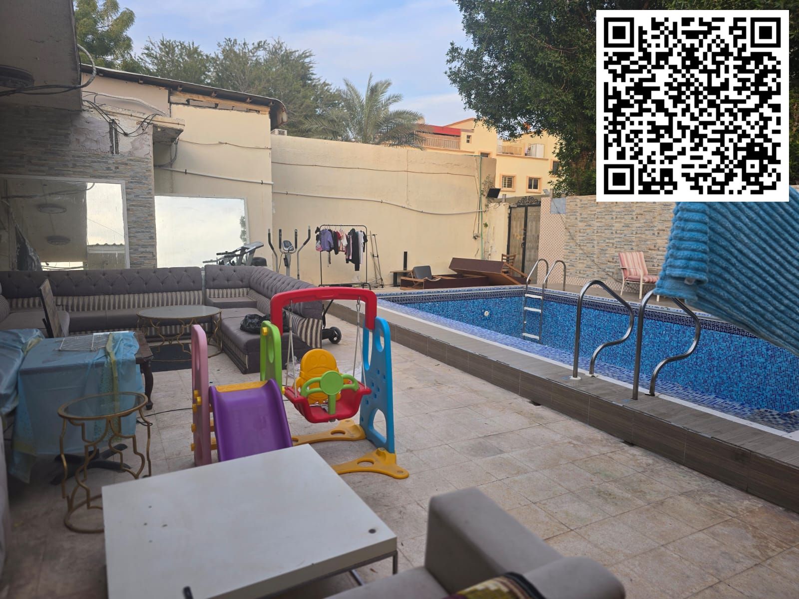Villa for sale in Al Rumaila, behind the Residence Towers. Area: 741.37 square meters. Number of bedrooms: 4. Asking price: AED 2,500,000
