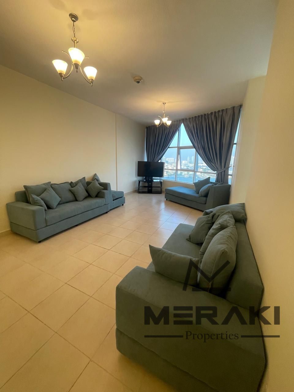 2BHK for ownership at Orient Towers with a monthly installment of 6,729 AED, ready to move.