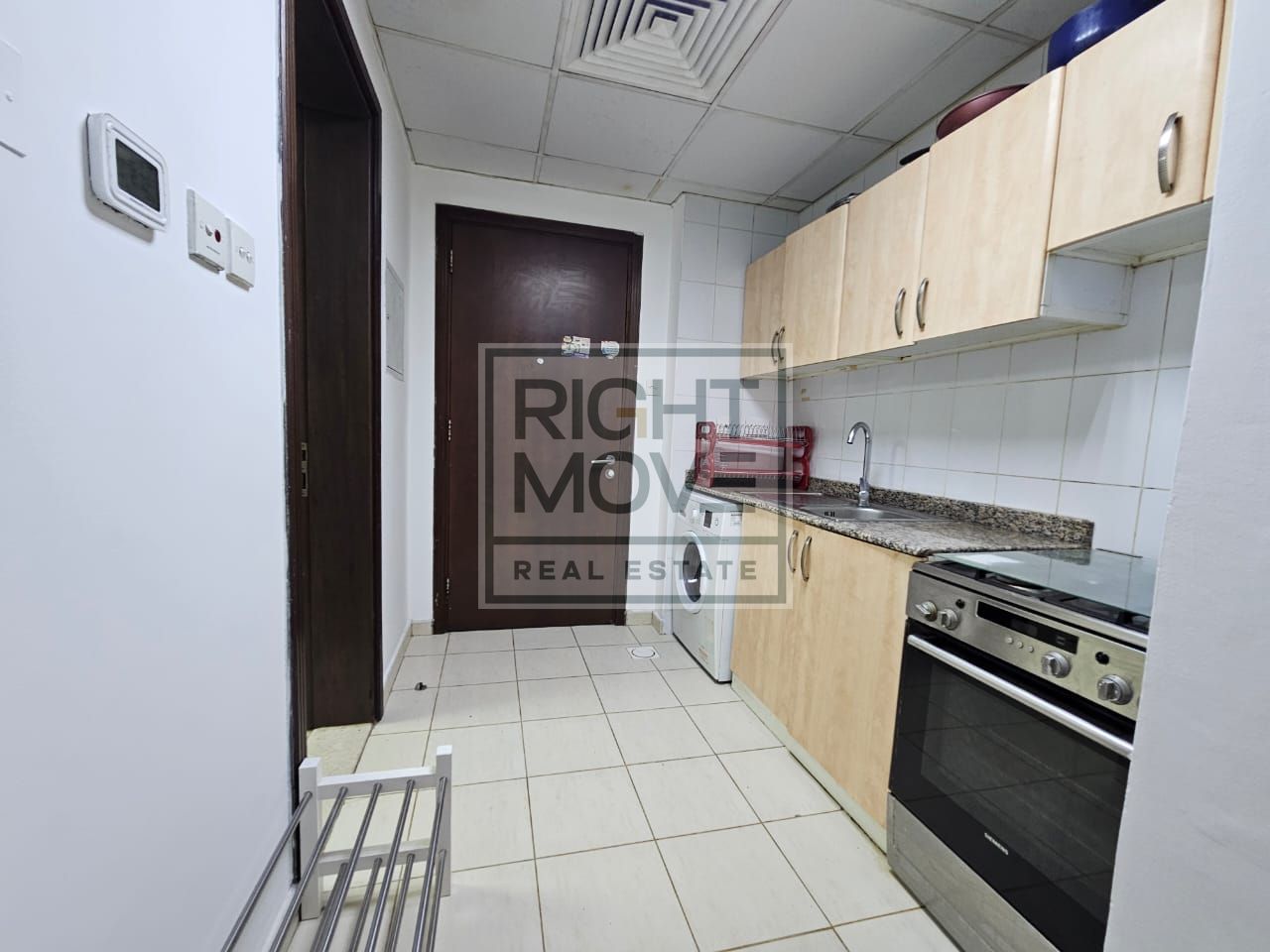 Studio with balcony for rent in Emirates cluster 35.000/