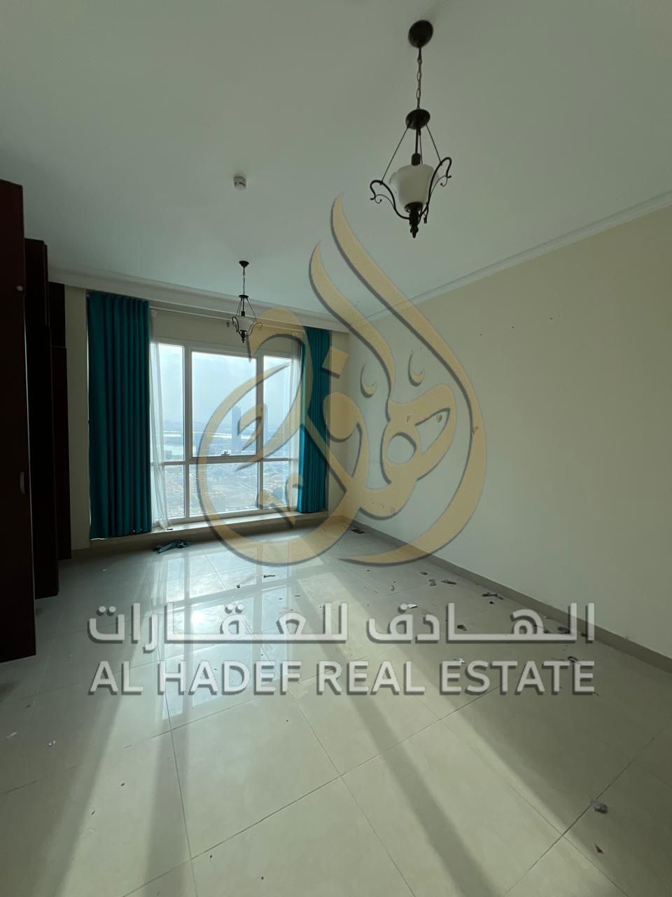 Available in Al Majaz 3: 2BR + living room + maid room + distributor, open view, with attractive free services, one of the best in Sharjah.