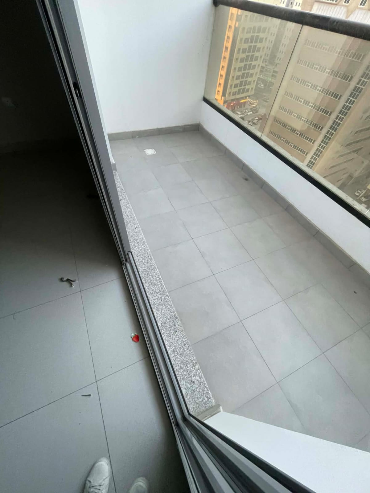 Two-bedroom apartment for rent in Al Khan, Sharjah, 3 bathrooms, balcony, free parking, annual rent AED 65,000 in 6/8/12 installments. Last 3 months b