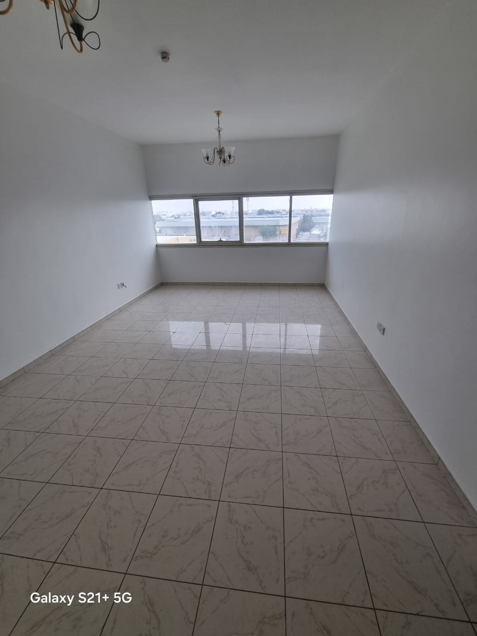 2BR apartment in Abu Shagara on Al Wahda Street, free chiller & maintenance, 2 bathrooms, prime location with easy access to Dubai.