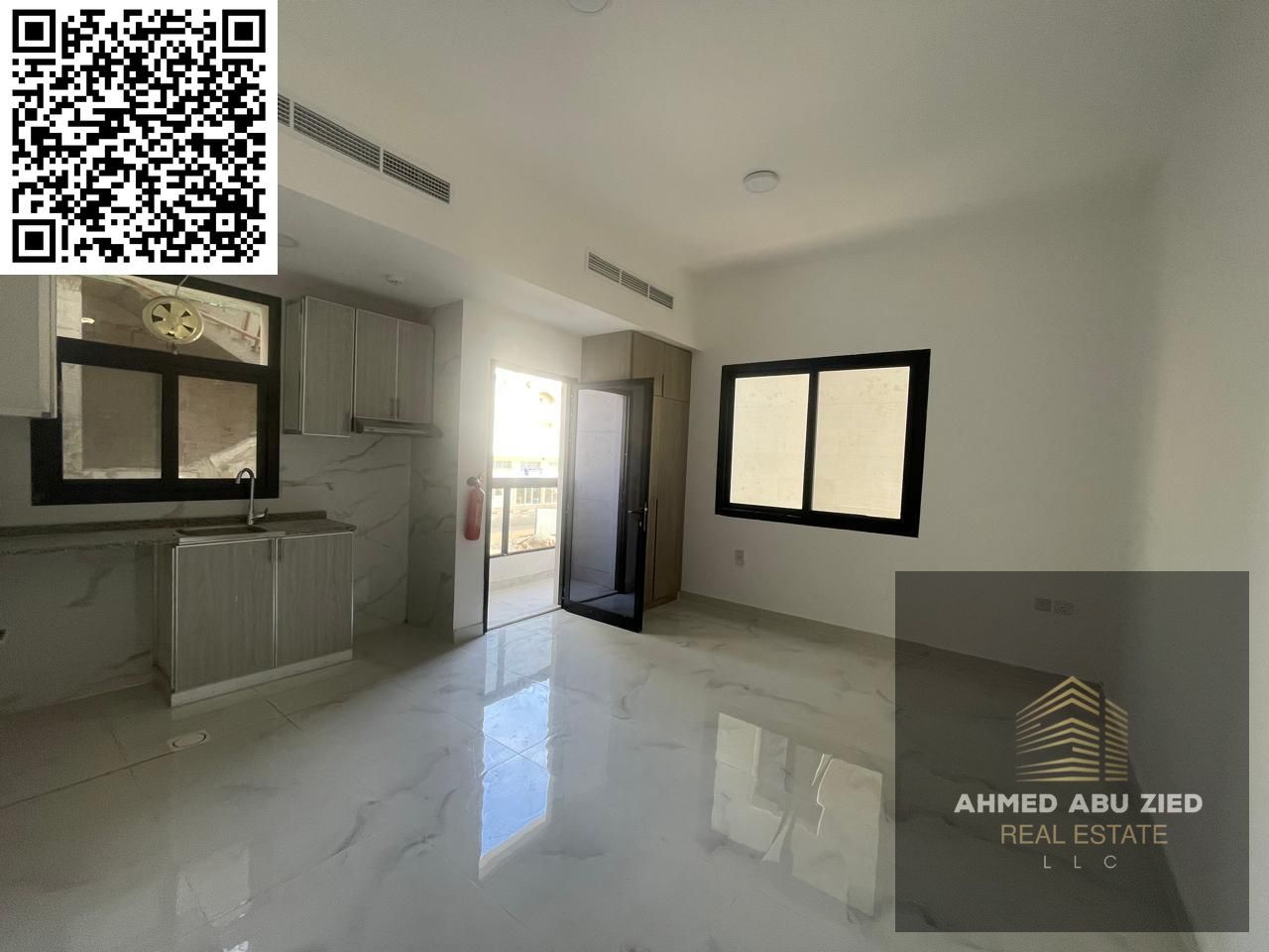 Brand new studio for annual rent in Al Alia Ajman, first tenant, with balcony, open view, modern finishing, and prime location near main roads