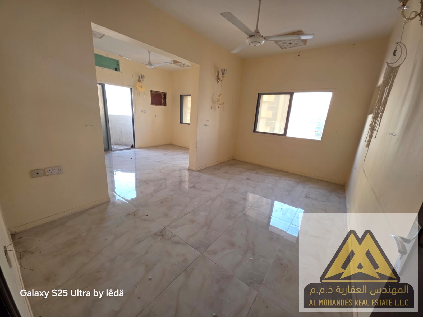 Lowest price for a three-bedroom apartment with a very large living room, second row from the Corniche, for annual rent in Al Nakheel.