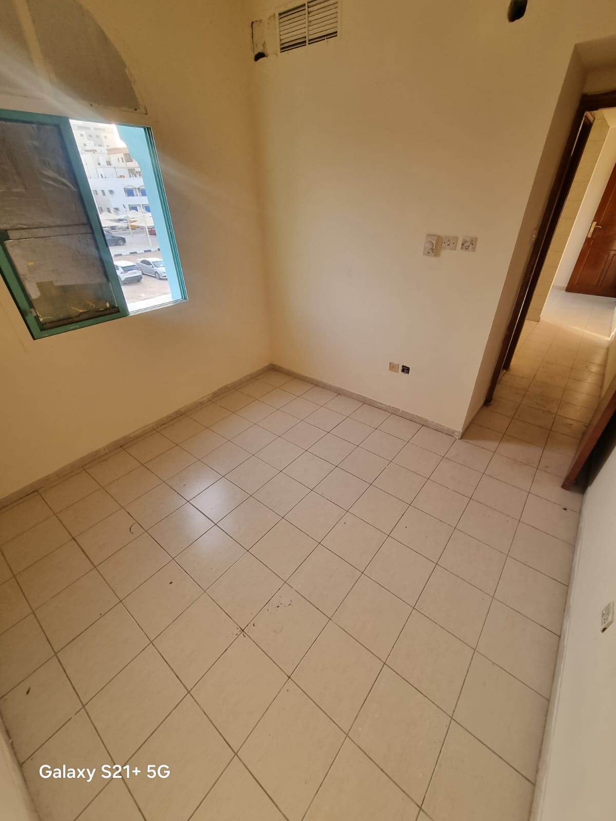 Spacious studio in Al Nasserya (official bachelors), good finishing, clean building, prime location near services and transport.