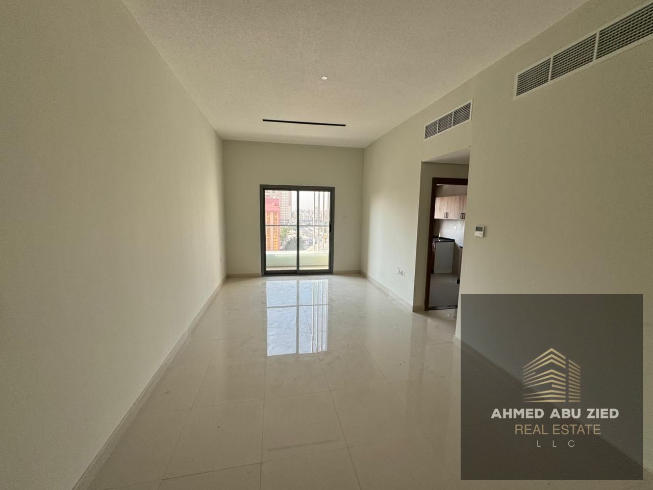 Largest 2-bedroom apartment with living room< 2 bathrooms, built-in wardrobes, central air conditioning, and a balcony with open view — brand new (fir