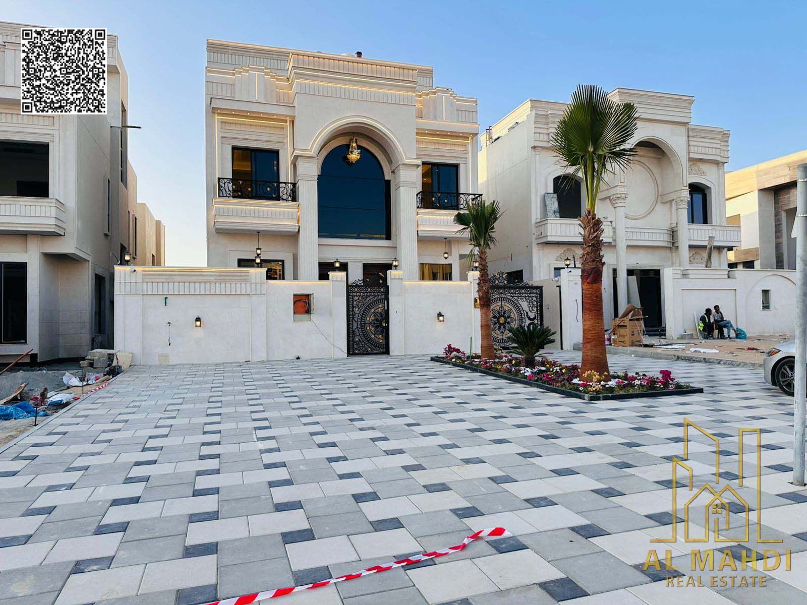 Luxury villa for sale in Al Helio 1 Ajman, located directly on a main road and facing the Citizens’ Villas area