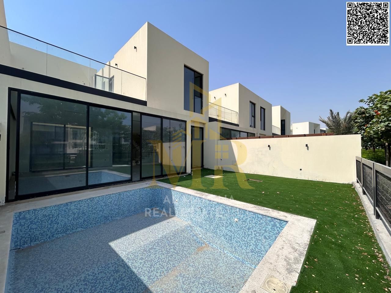 Distinctive villa for sale in Al Zorah, featuring a luxurious design and spacious layout offering maximum comfort and privacy. The property spans 3,10