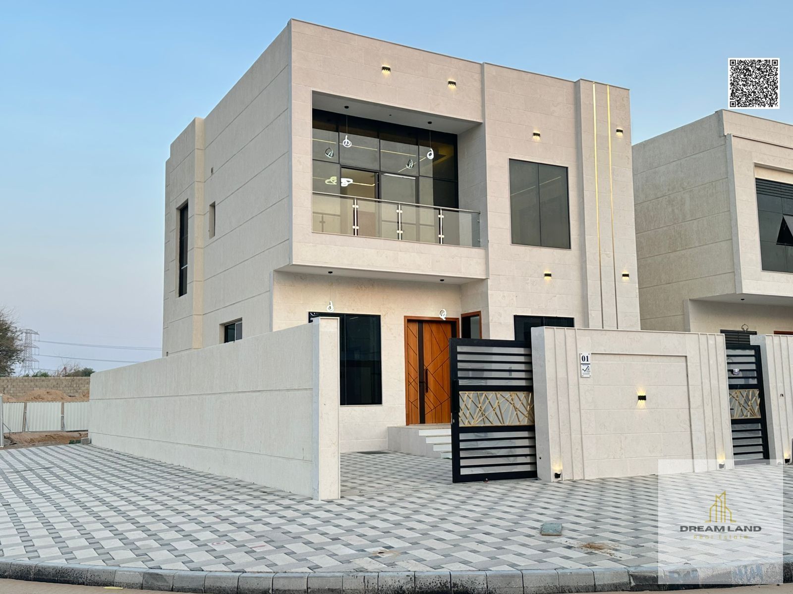 Direct from the owner, including all ownership fees: a villa in one of Ajman's most luxurious villas, built and finished to a super deluxe standard, w