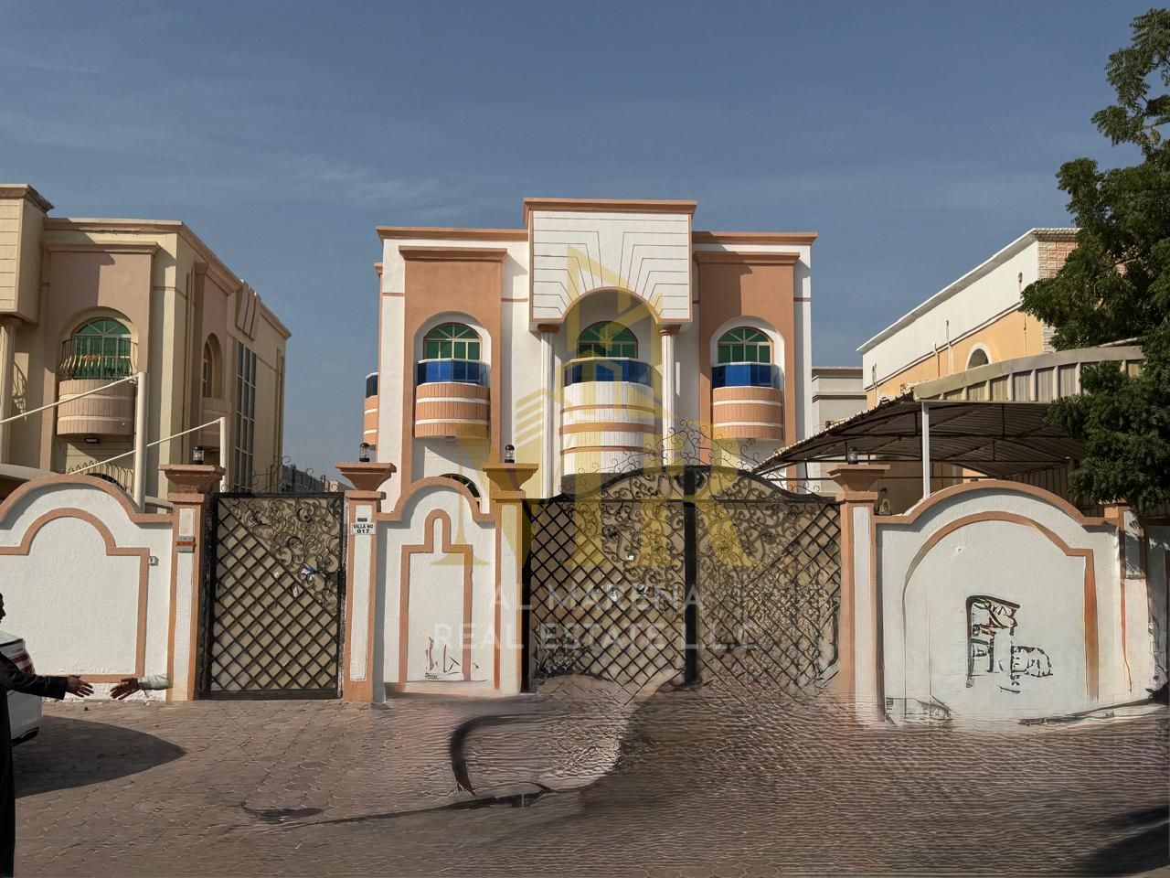 Large villa for sale in Al Rawda, fully renovated, near Sheikh Ammar Street. Price includes electricity, air conditioning, and water. Freehold ownersh