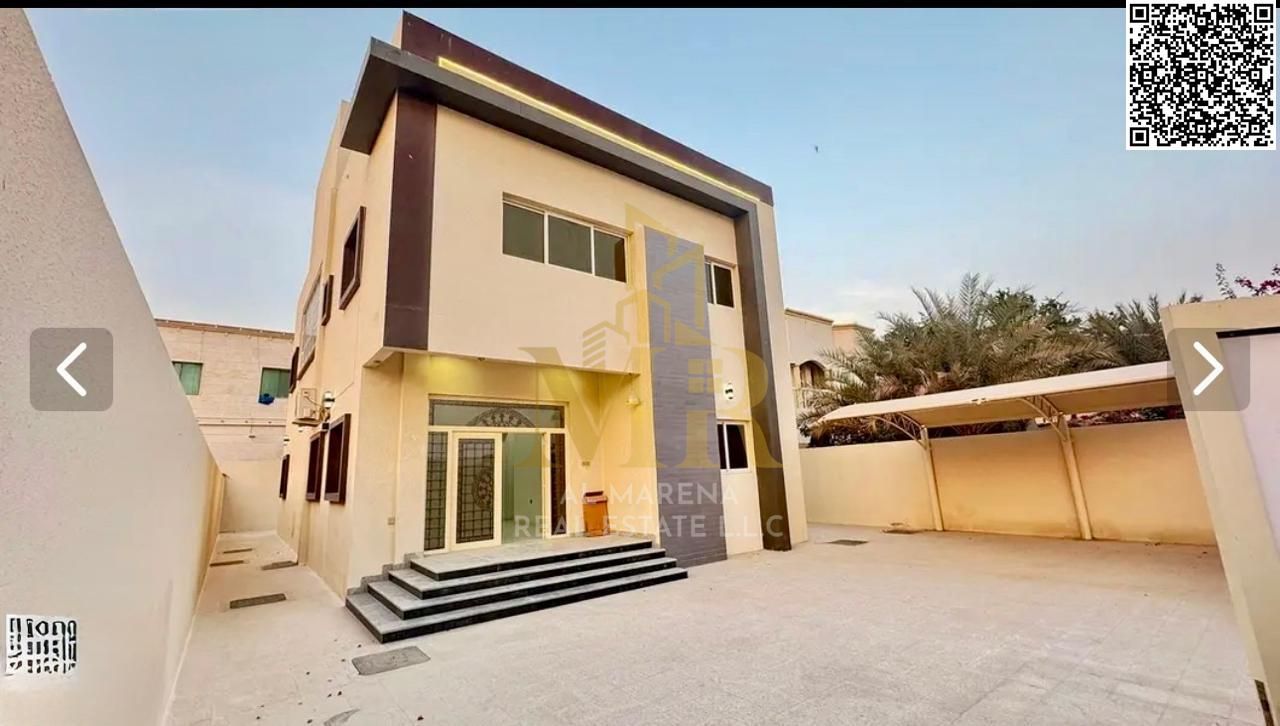For sale in Al Rawda 1, Ajman: a two-story villa with a rooftop terrace and six bedrooms. Priced at AED 1,850,000, including electricity, water, and a