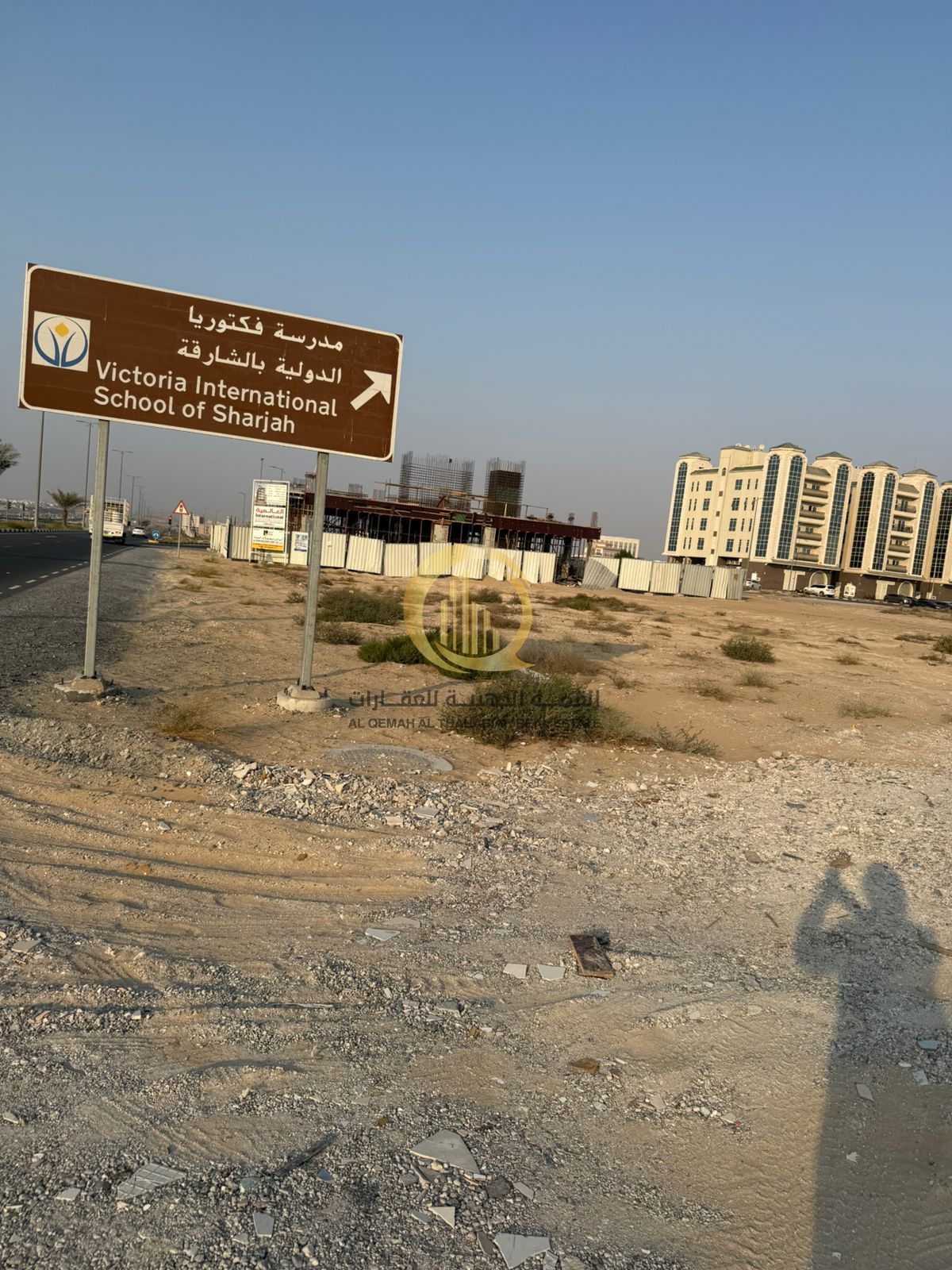 Commercial land for sale in Tilal City, permit for ground floor and four floors, freehold ownership for all nationalities.