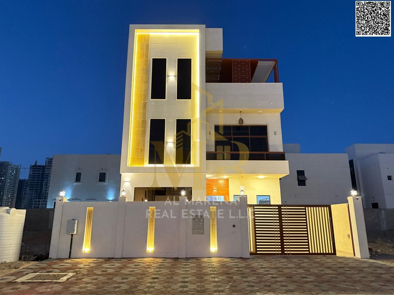 Luxury villa for sale in Al Amerah featuring a modern design and spacious layout. The property consists of two floors plus a rooftop, built on a 3,014