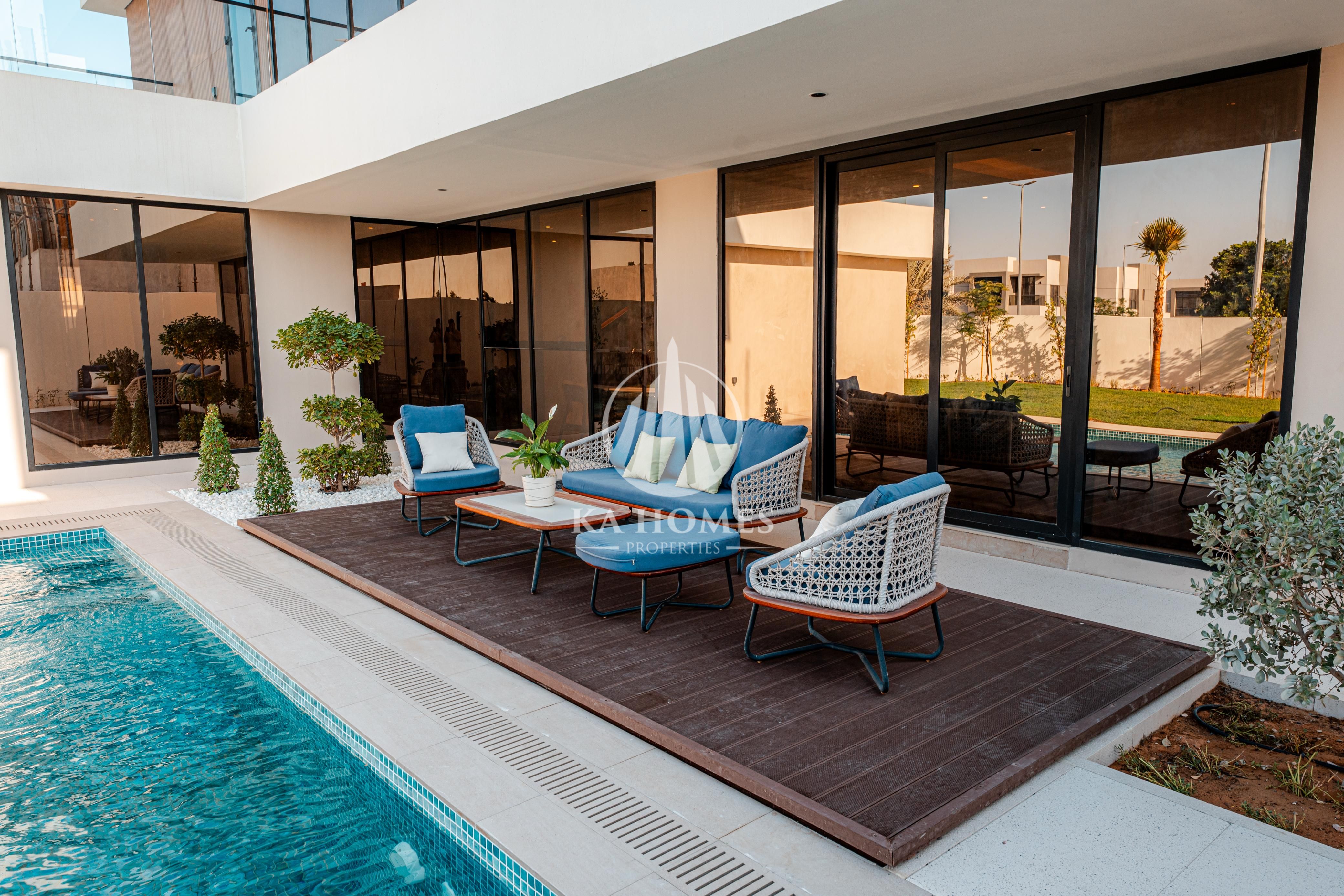 stand alon villa with 3 master bedrooms, 1 master majlis (formal sitting room), dining room, living room, and a master maid's room, along with an outd