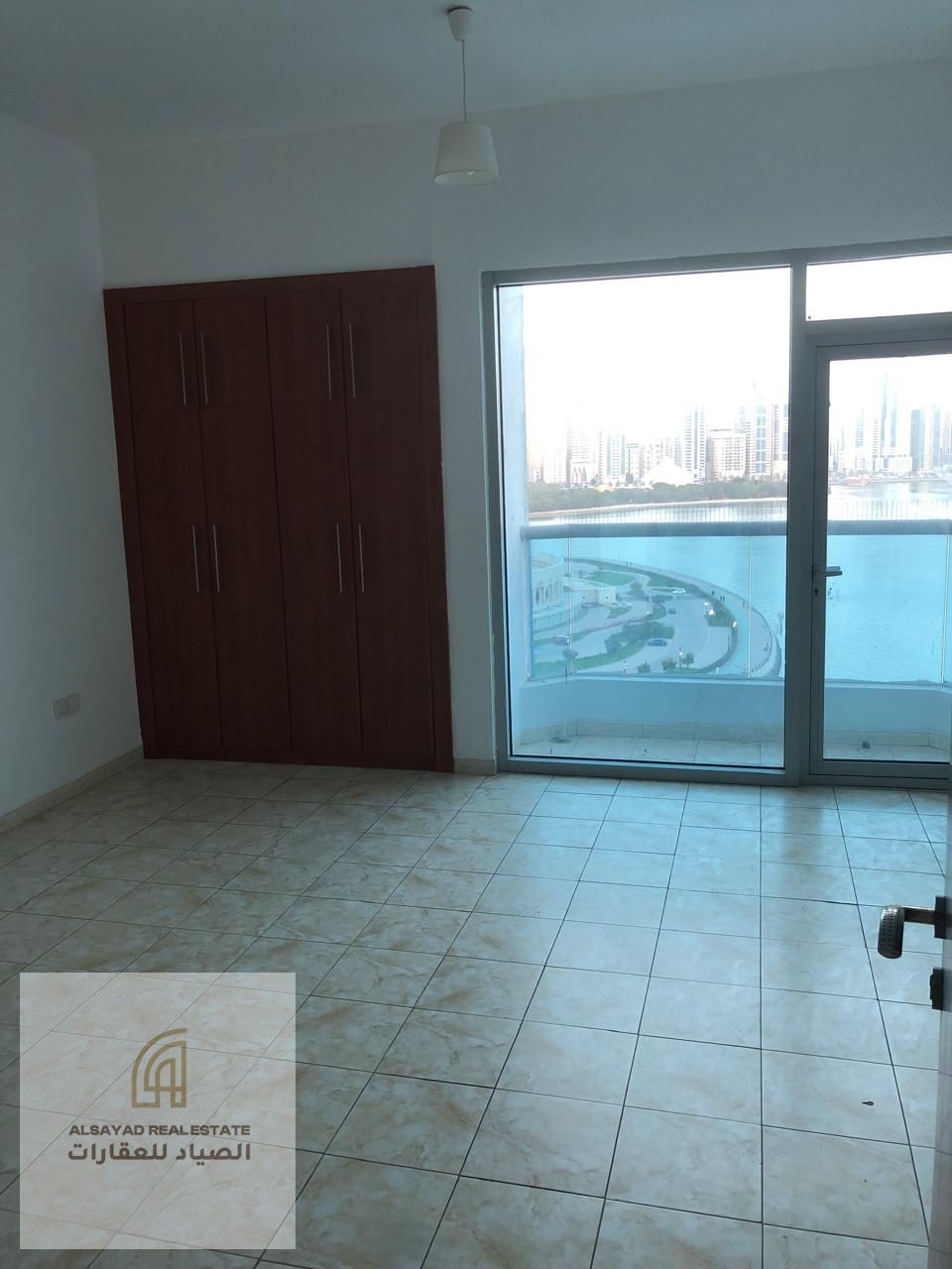 For sale: Two-bedroom apartment with living room in Al Majaz 3.