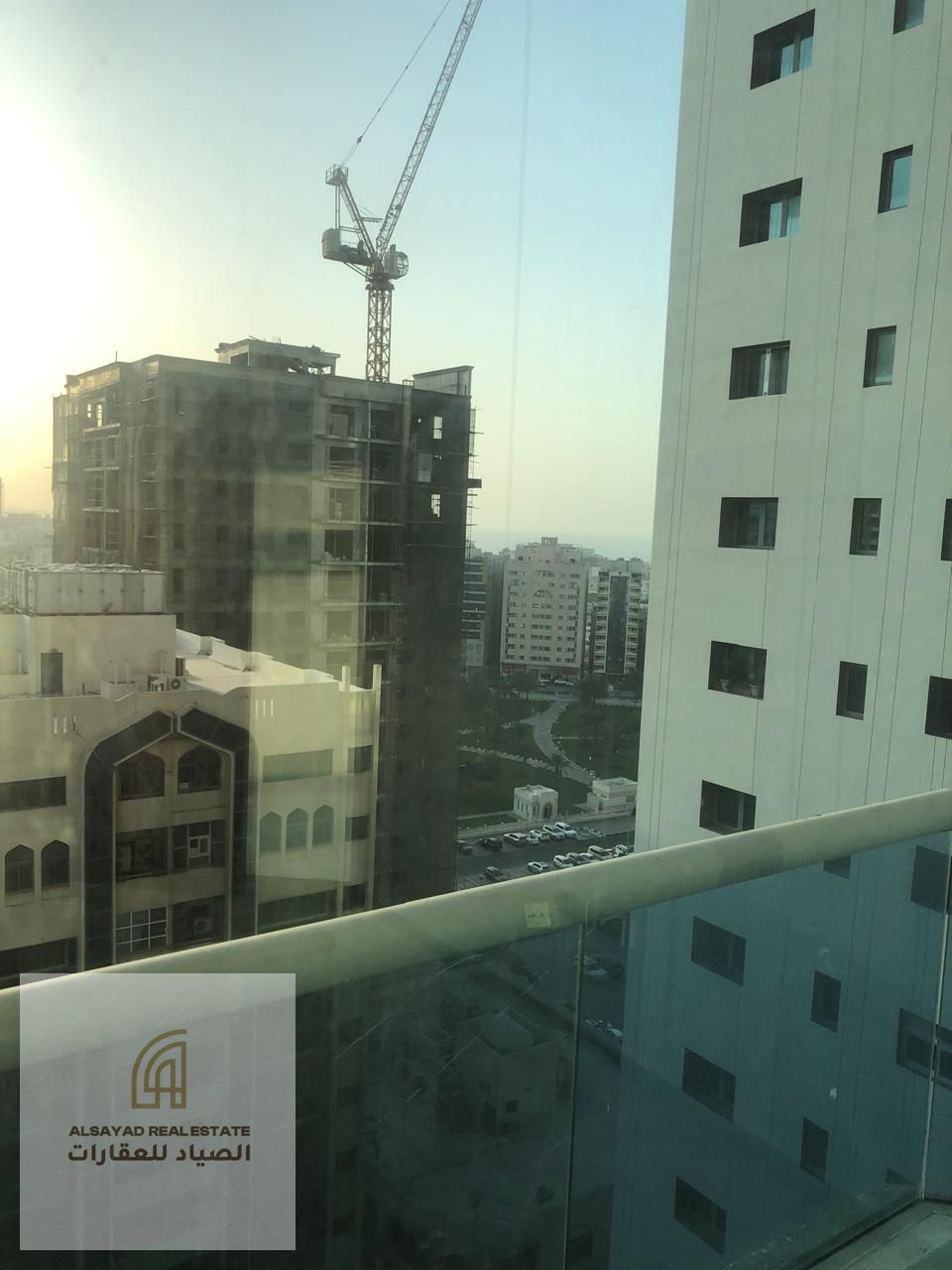 Two-bedroom apartment with a living room for sale in Al Majaz 3, 200 sqm, with parking. Service fees AED 18,000. Price AED 960,000; AED 875,000 withou