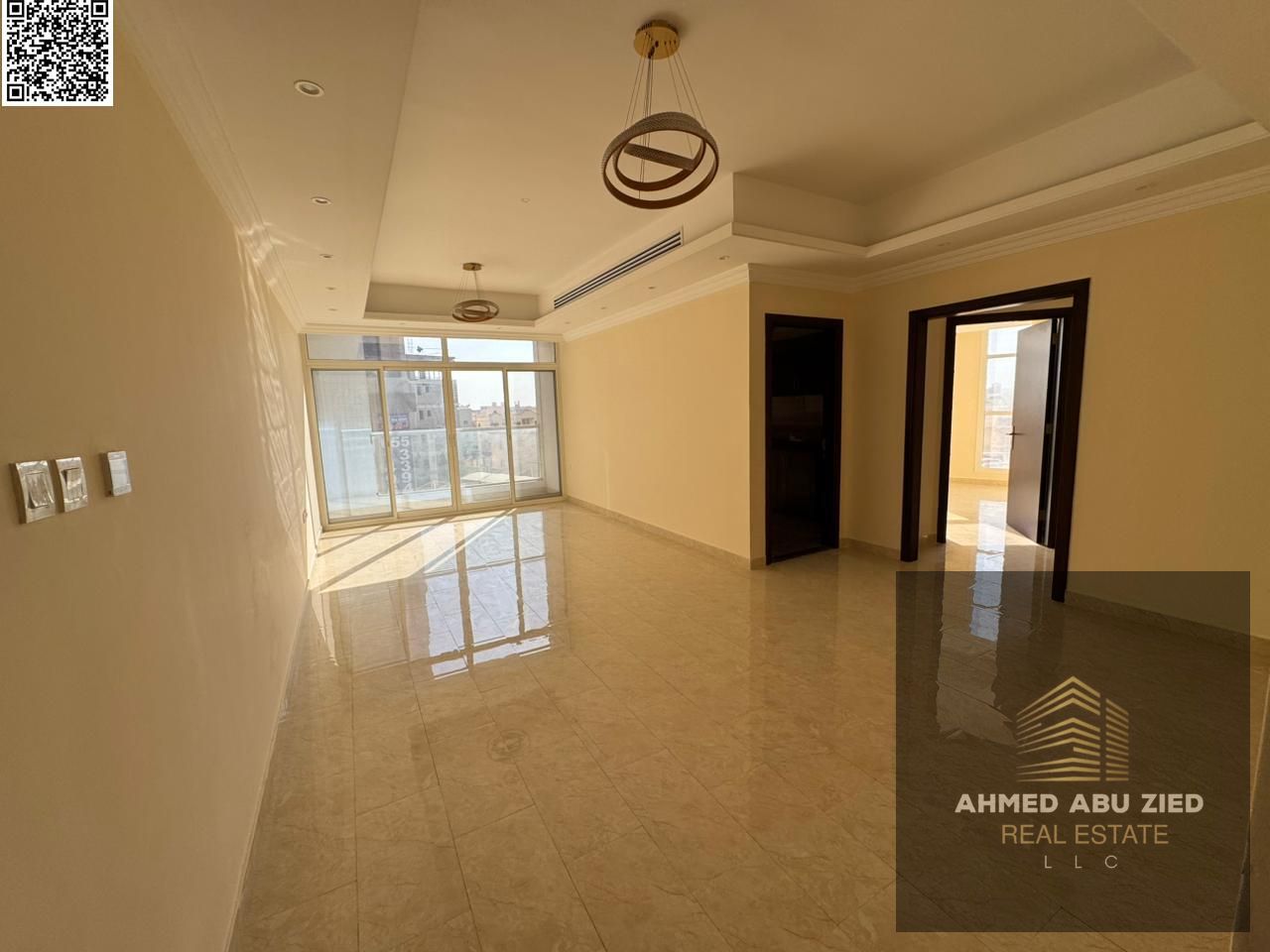 3-bedroom apartment with a living room for annual rent in Al Rawda 2, Ajman. Prime location opposite Kenz Mall and next to Layali Beirut.
