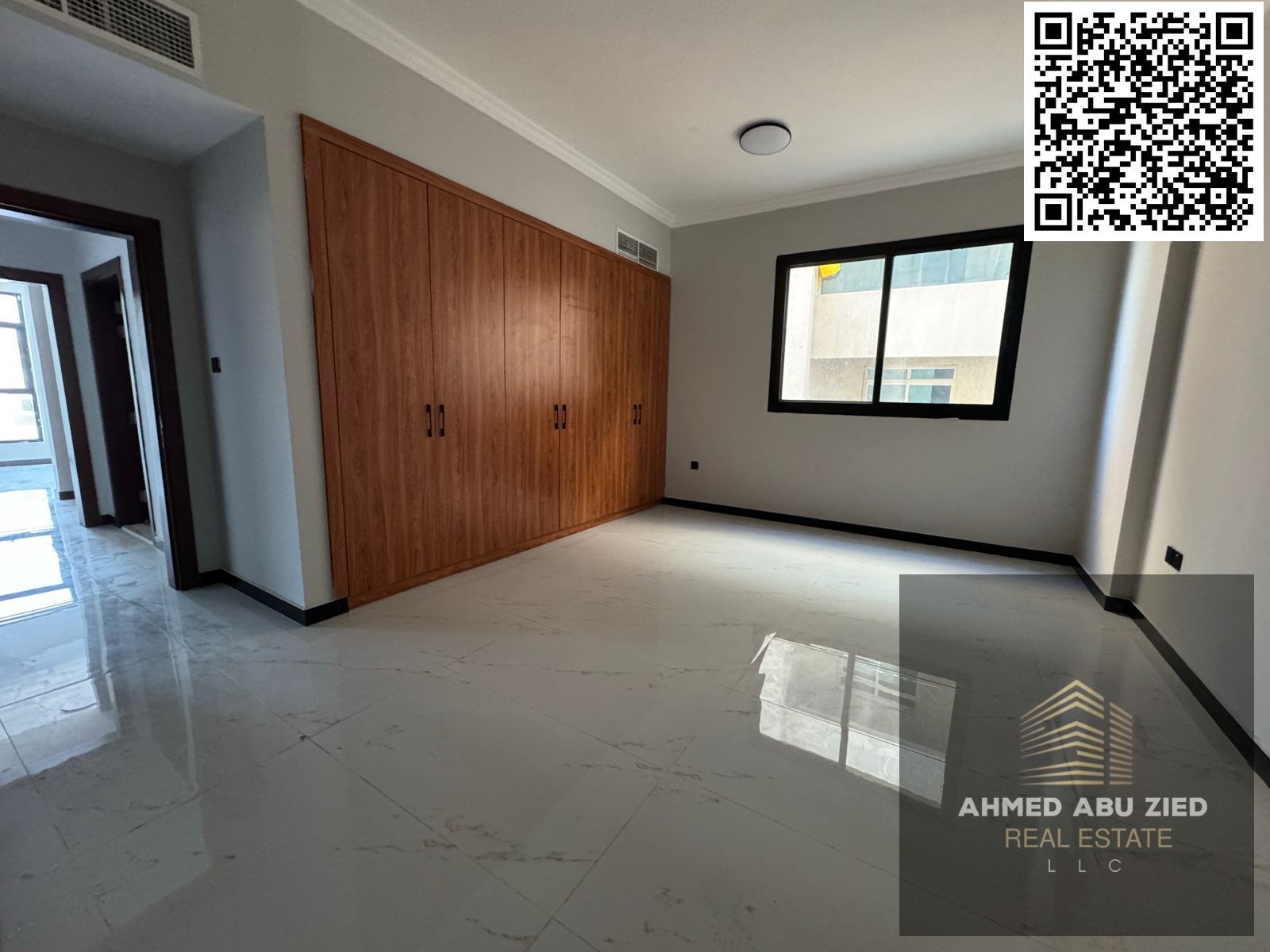 Beautiful two‑bedroom apartment in Al Mowaihat | Prime spot near key access and the international school | Master rooms with modern finish | Central A