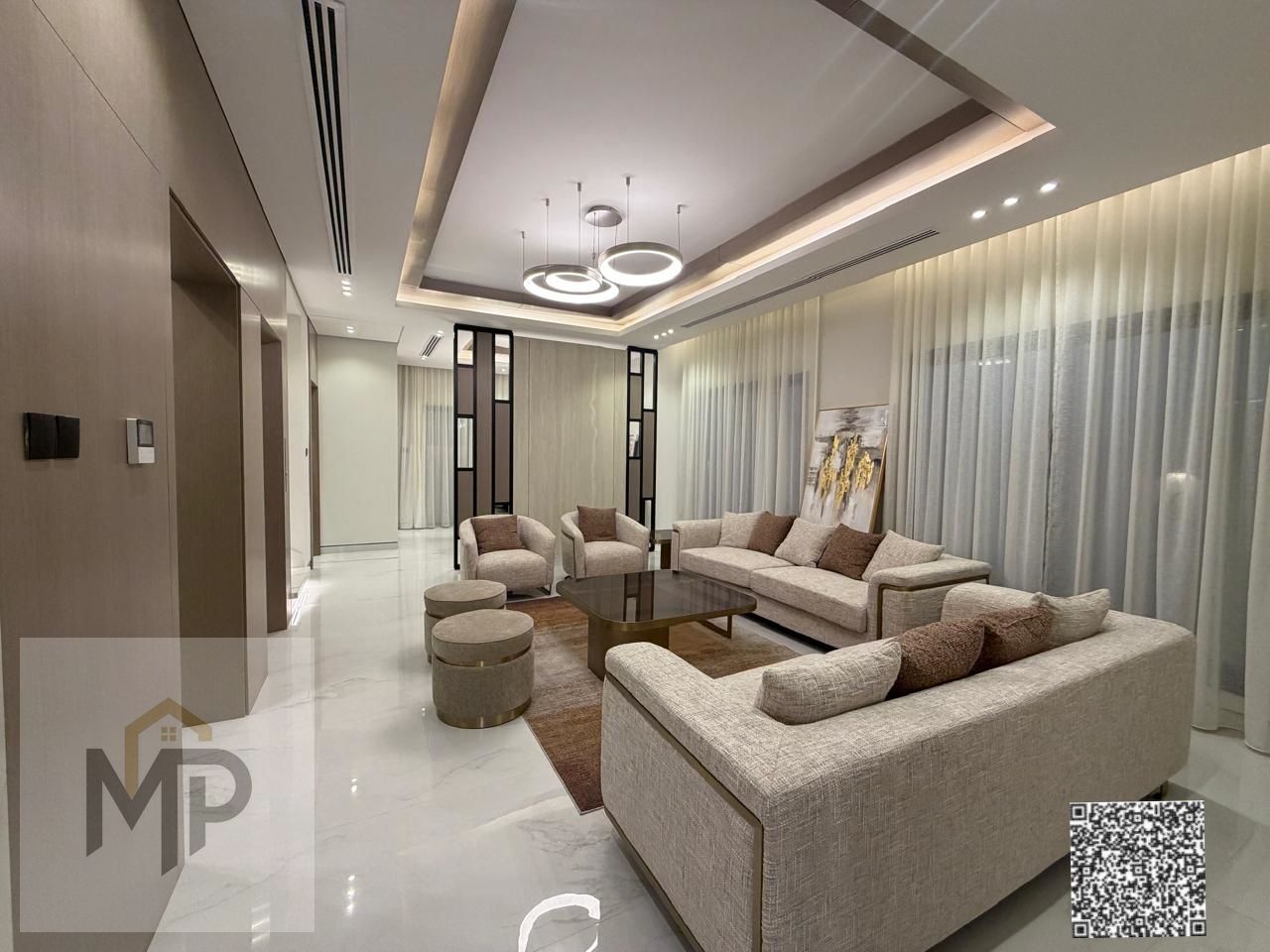 Semi-detached villas for sale in Al Tallah with a sophisticated modern design, large areas, a private elevator, and a distinctive rooftop