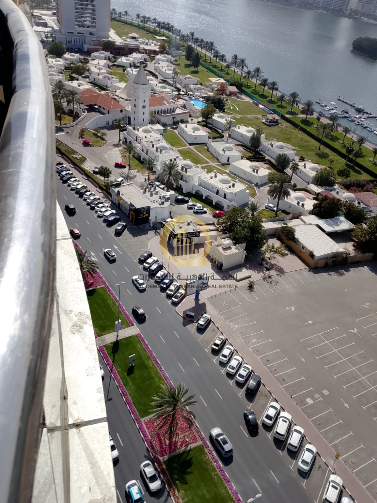 For sale: Land in Sharjah, Al Majaz 2, with an area of 20,000 sq. ft. , overlooking Al Wahda Street, opposite City Centre.
