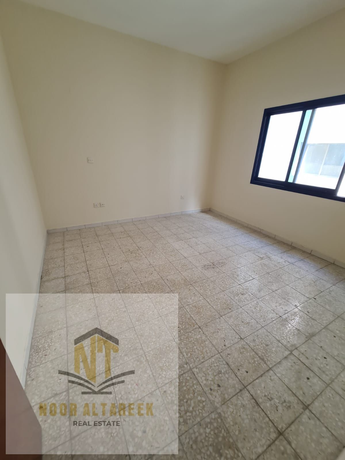 Apartment available for rent in Al Majaz 1, located in a convenient area close to supermarkets, restaurants, schools, and public transportation, provi