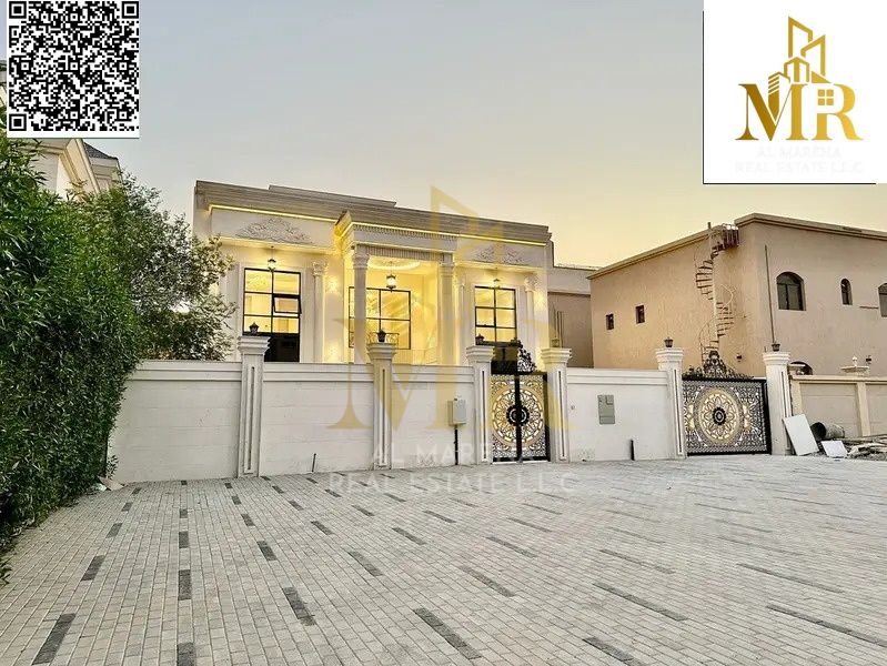 Own a villa in one of the most prestigious areas of Ajman, classic style, two floors and a roof, with a price that includes registration fees, air con