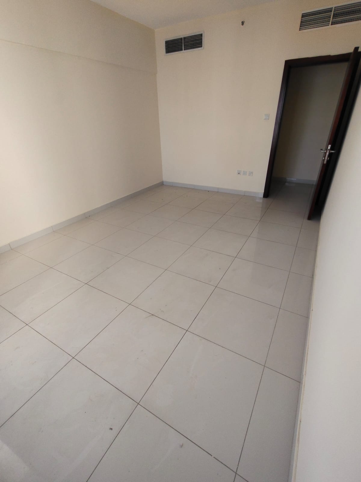 A distinctive apartment for annual rent in the Al Taawun area in Sharjah, strategically located close to Al Buhaira Corniche, offering a calm and comf
