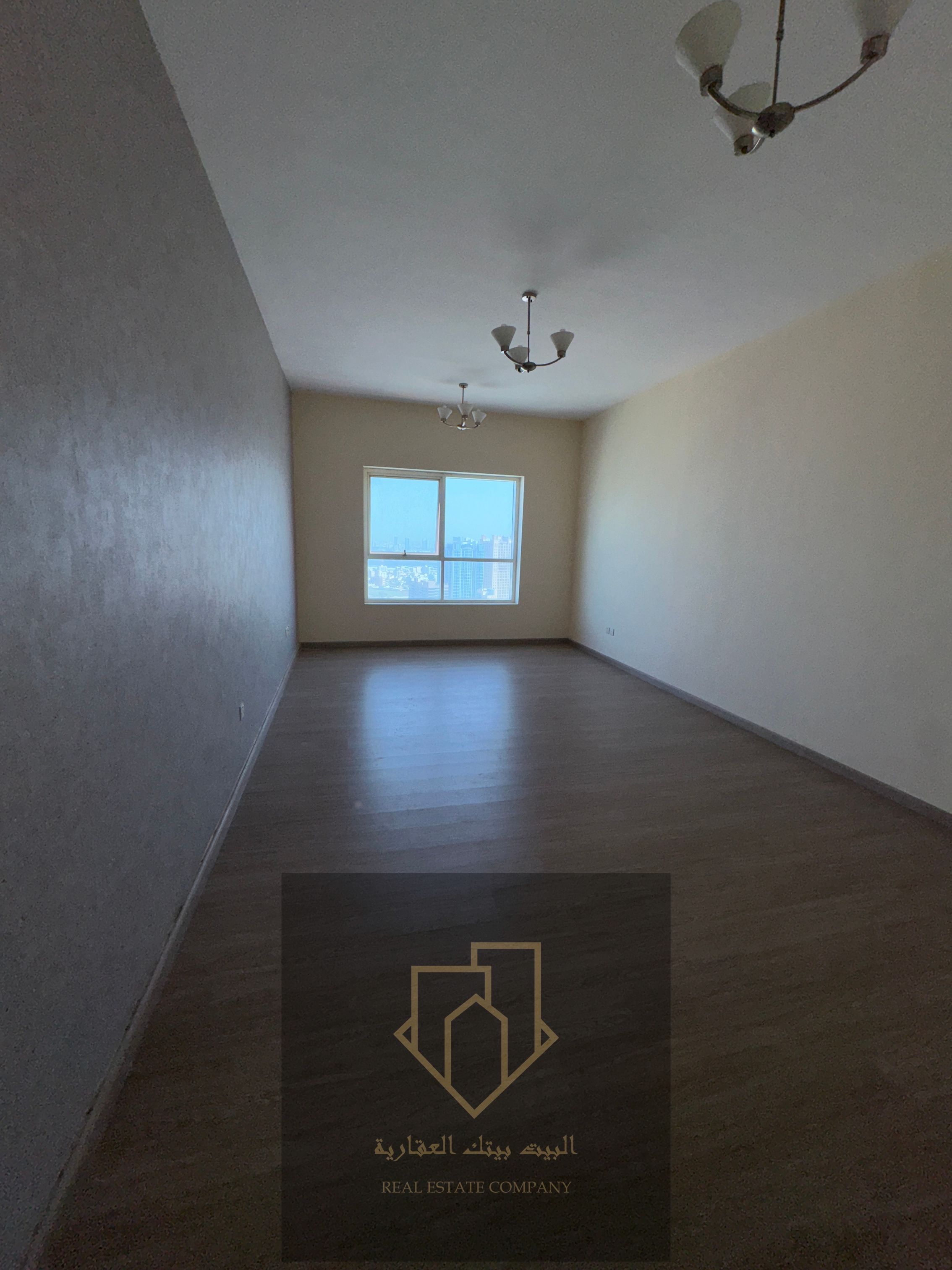 Two bedrooms and a living room, free air conditioning and free parking, annual rent in the Corniche area, large space