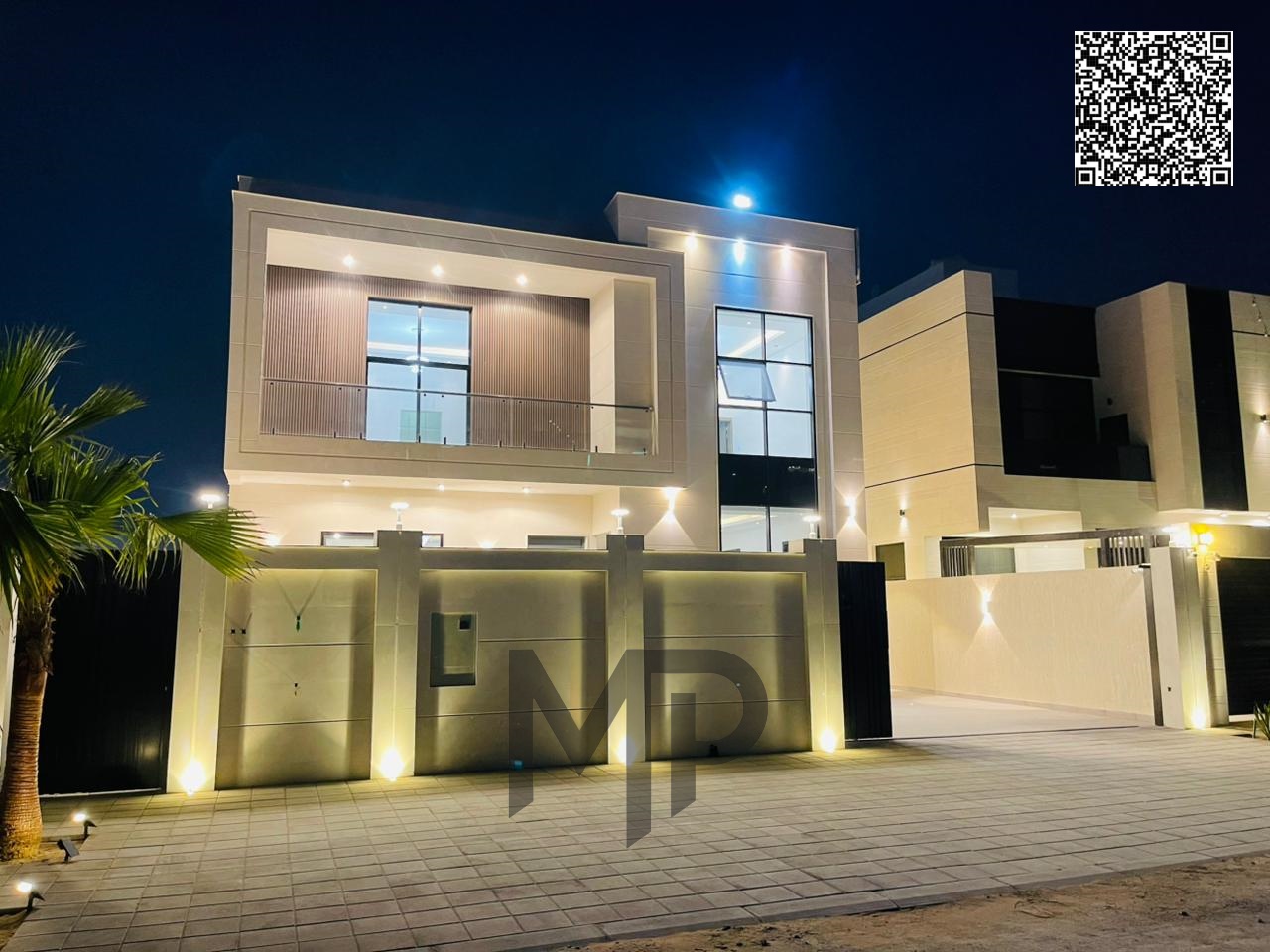 A luxury villa with a land area of 4100 square feet, featuring 5 master bedrooms and a spacious garden, in a prime location behind Al Watan Universi