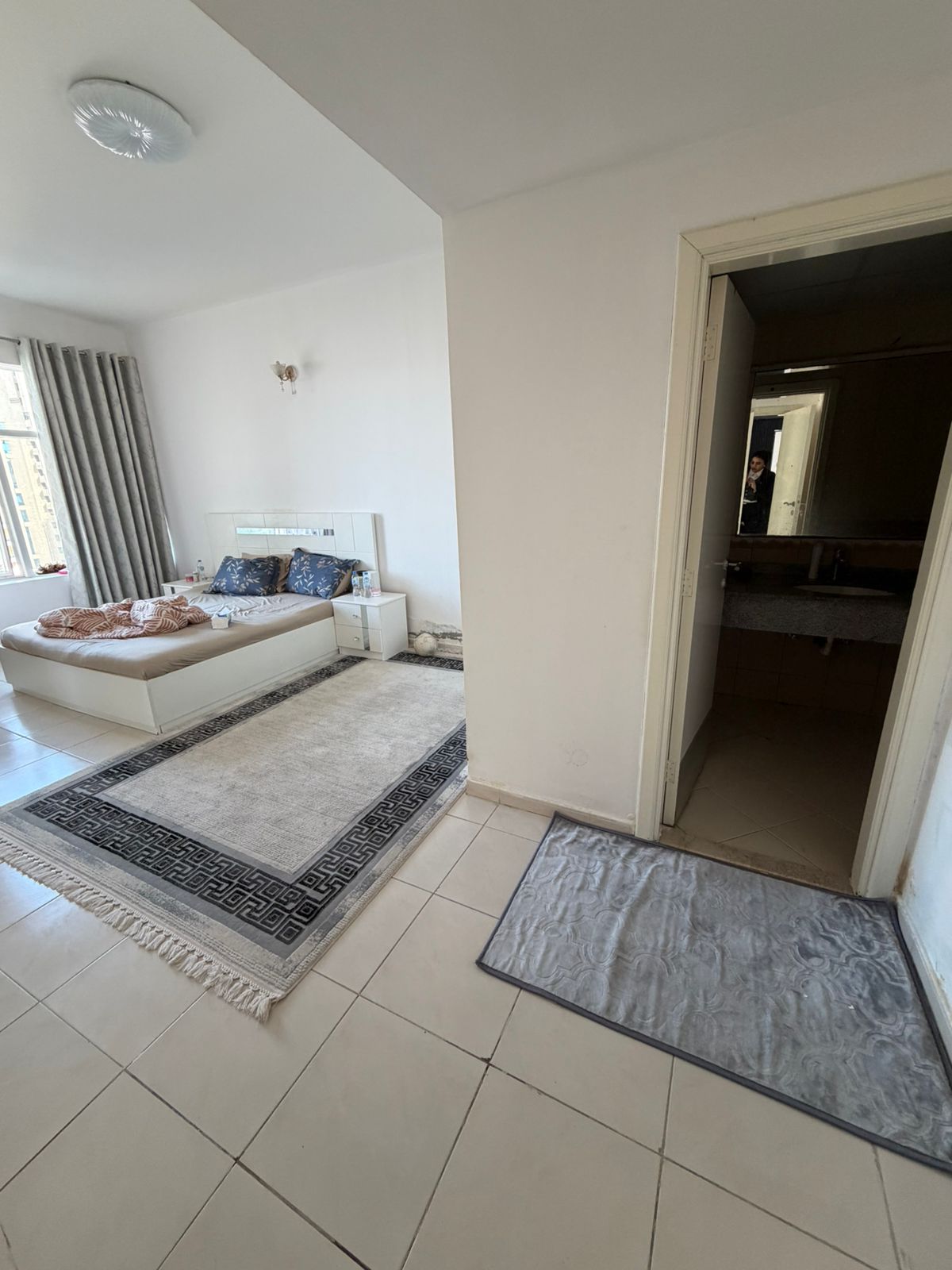 Two bedroom apartment for sale in Horizon Towers 1550 sqft 3 bathrooms open view new furniture private parking 600000 AED cash ready to view