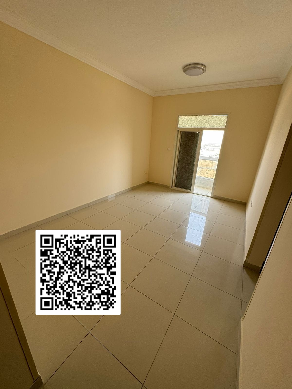 A unique opportunity for annual rent: a one-bedroom apartment with a living room for just 32,000 AED in a vibrant location close to all essential serv