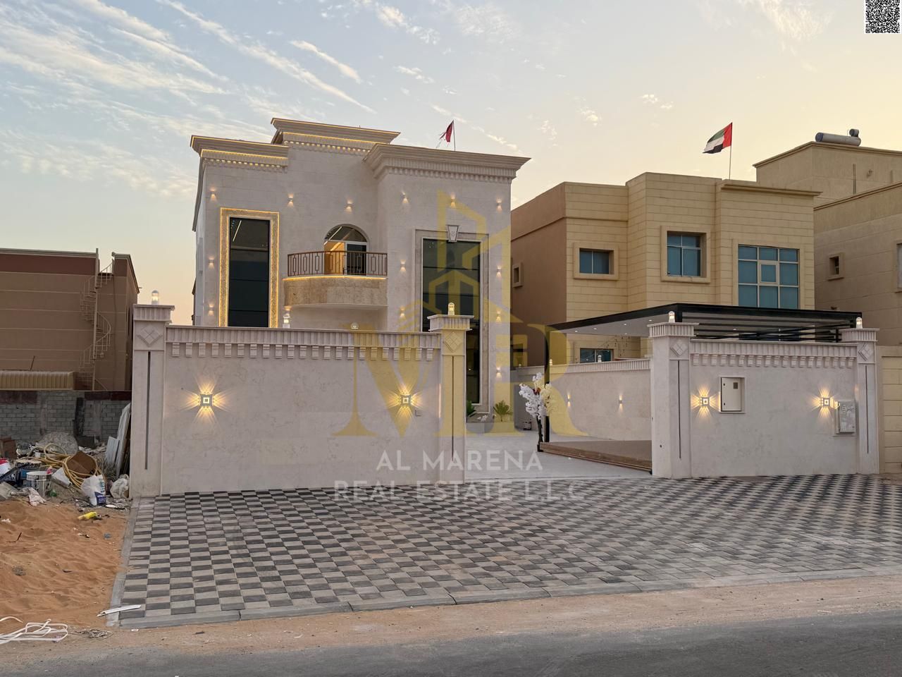 Villa for sale in Al Rawda 1 area, price includes electricity, water, and air conditioning. Freehold ownership for all nationalities.