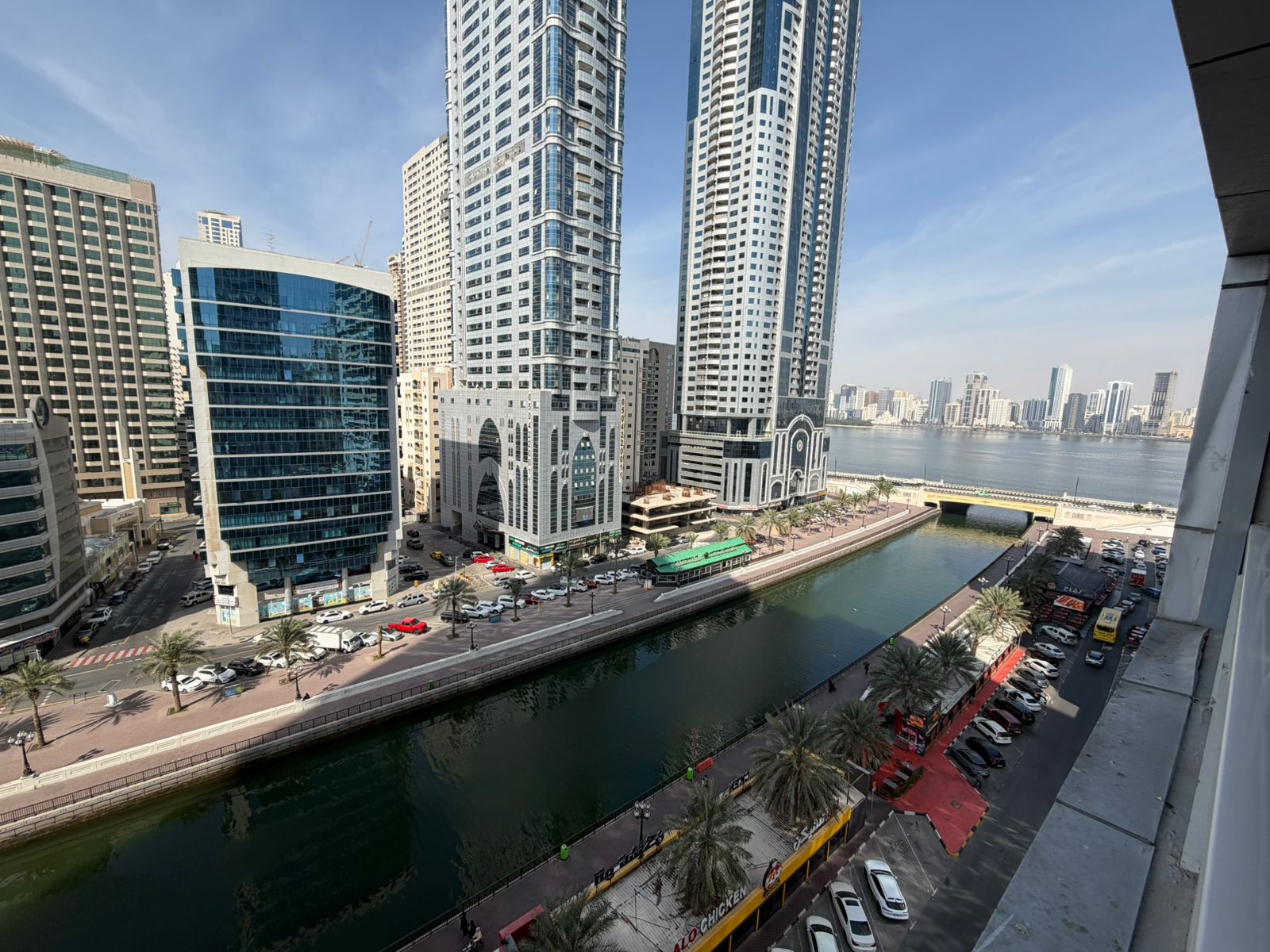 Sea view overlooking Mamzar, Al Qasba, and Khalid Lake | 2 balconies | Master bedroom | Elegant finishing | Flexible payment options