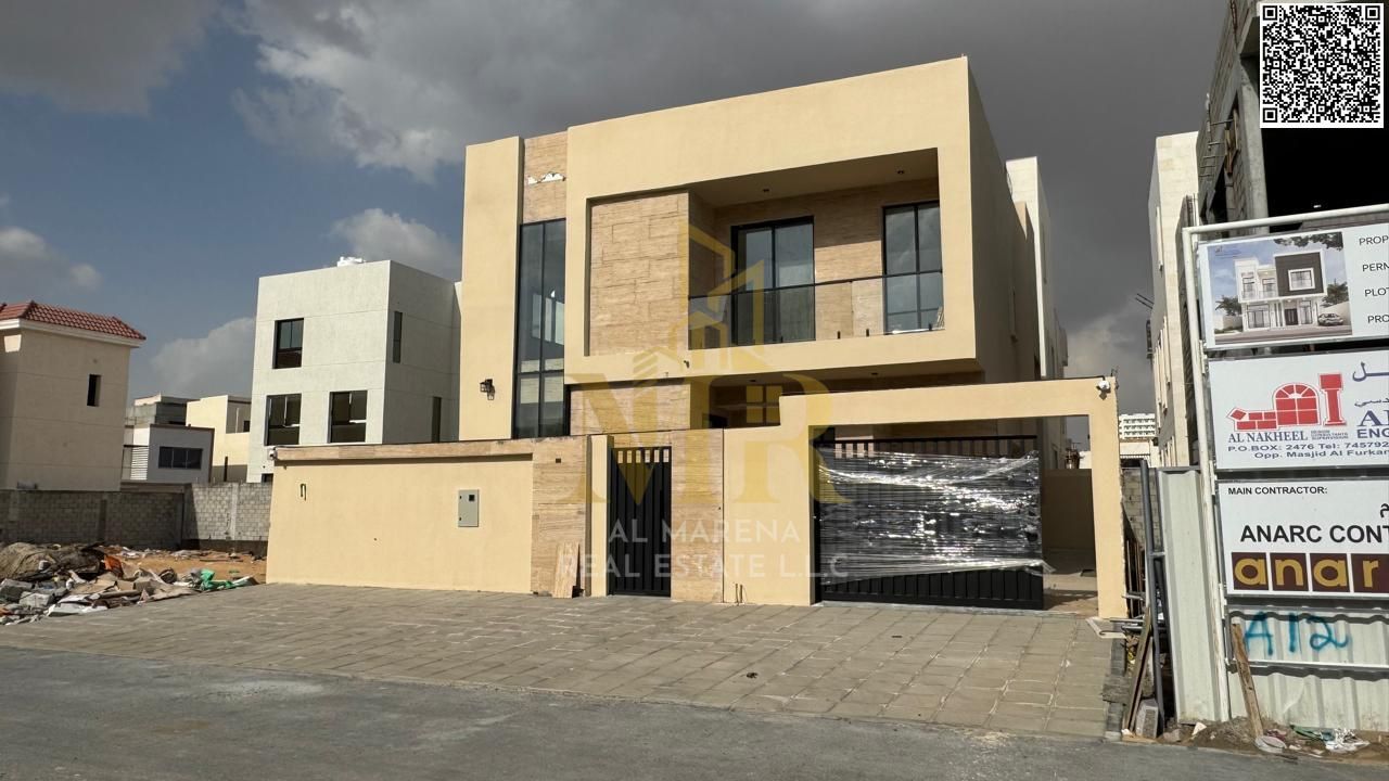 Distinctive villa for sale in Al Yasmeen, ideally located directly behind the park, offering a peaceful environment and open views perfect for family