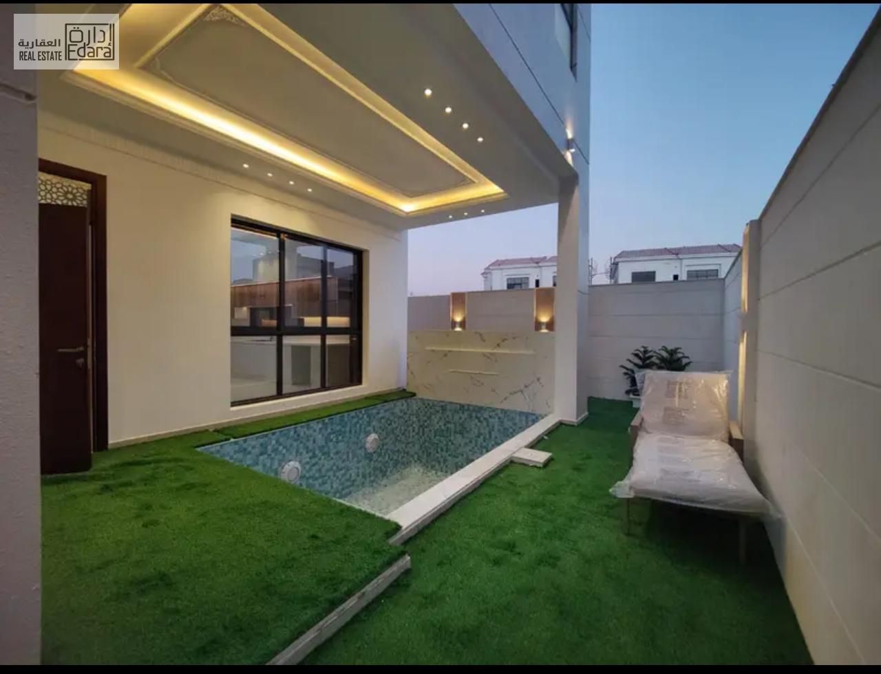 Luxury villa for rent in Al Yasmeen – Ajman, directly facing the park, featuring a private swimming pool, 6 spacious bedrooms, elegant majlis, bright