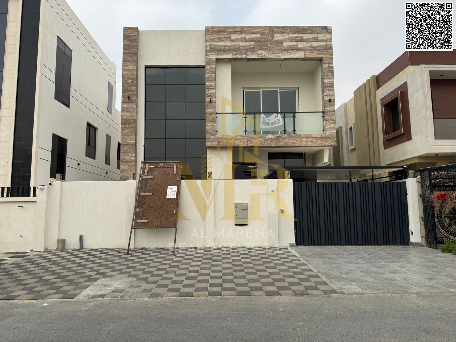 Distinctive villa for sale in Al Yasmeen featuring a modern design and spacious layout. The property consists of two floors plus a rooftop, with a bui