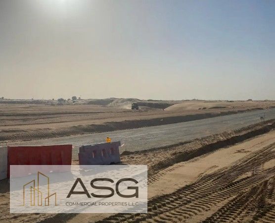 Prime Location on Dubai-Hatta Road | No Fees / Freehold Industrial Plot | 24-Month Payment Plan