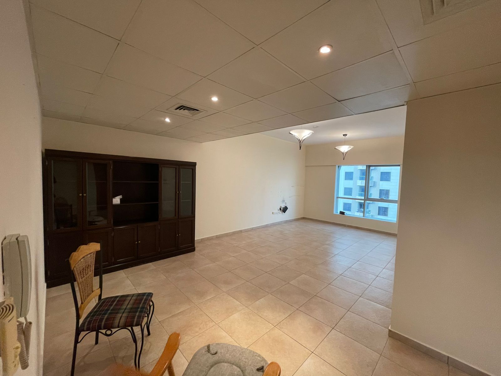 Free AC & parking + gym & pool | 2BR hall with built-in wardrobes | Prime location on Dubai exit near Khalid Lake.