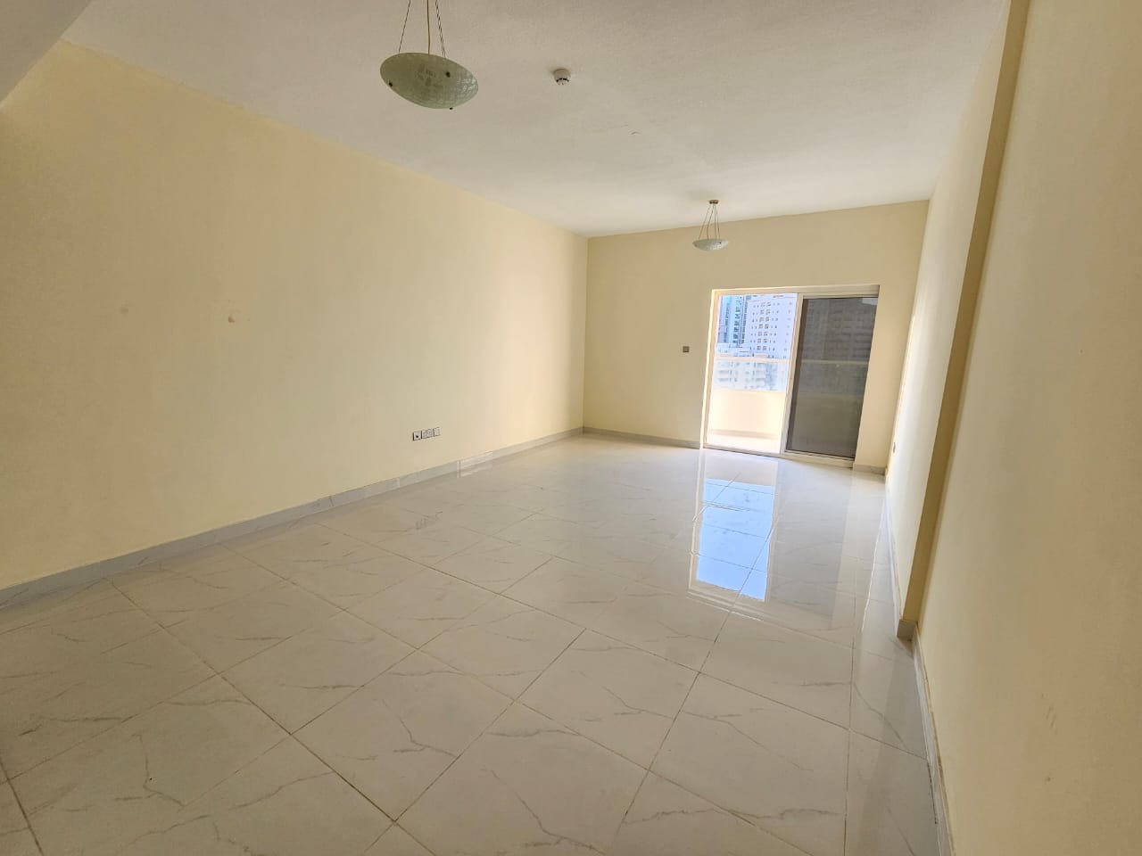 Second tenant | Free parking + 1 month free | 2 master bedrooms, hall & balcony with open view | Prime location near all services & Dubai exit.