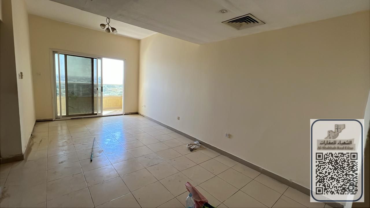 Great Ownership Opportunity — 2 Bedroom Apartment with Front View, Balcony & Parking in Garden City Towers Al Hamidiya