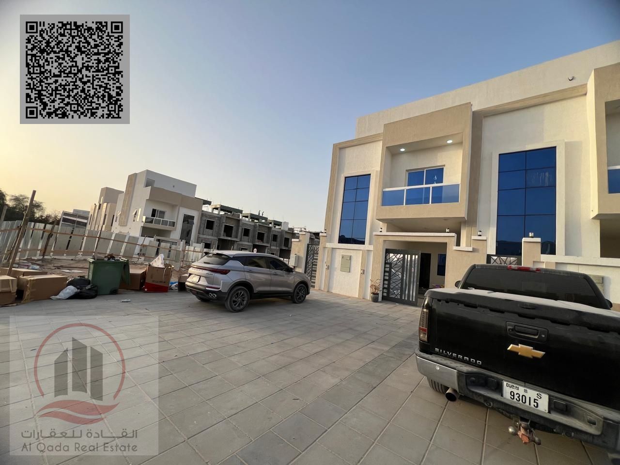 Villa for sale in Ajman, Al Helio area, including electricity and air conditioning. 4 master bedrooms, majlis, living room, maid's room, and roof terr