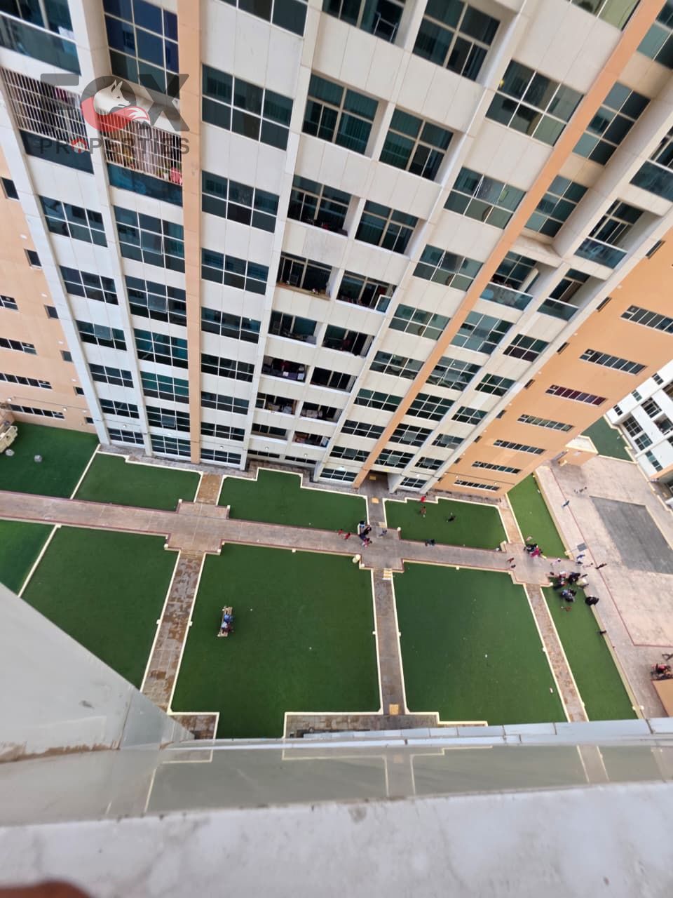Two bedrooms and a living room for annual rent in Ajman One Towers in the Al Rashidiya 3 area,close to Ajman Corniche. 2 balconies,3 bathrooms, parking