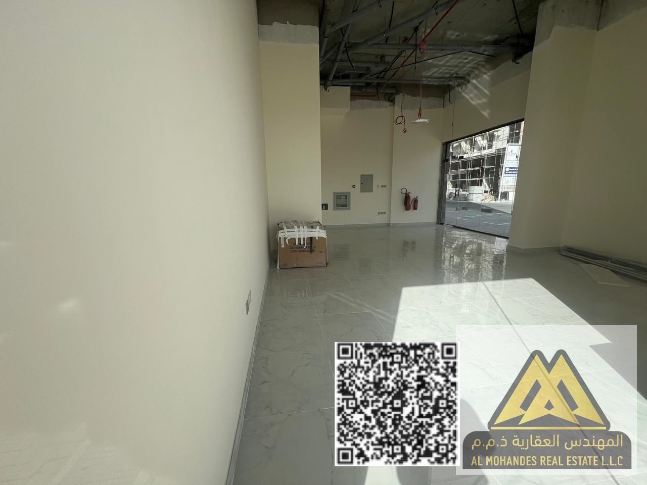 Commercial space for annual rent in Al Jurf 3, in a prime and vibrant location close to residential areas and services, suitable for small businesses.