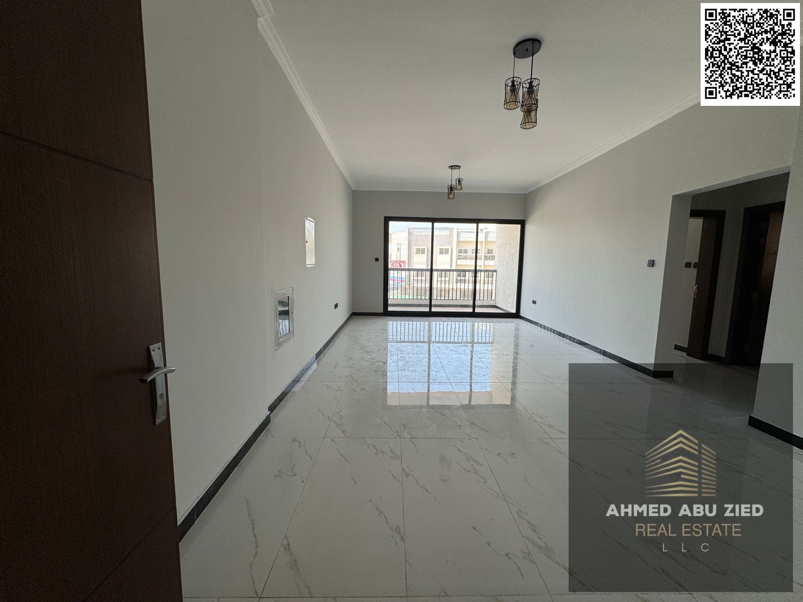 Largest 2BR hall in Al Mowaihat 3 for annual rent, master rooms, 3 baths, spacious hall with balcony, built-in wardrobes, prime location, 1 month free